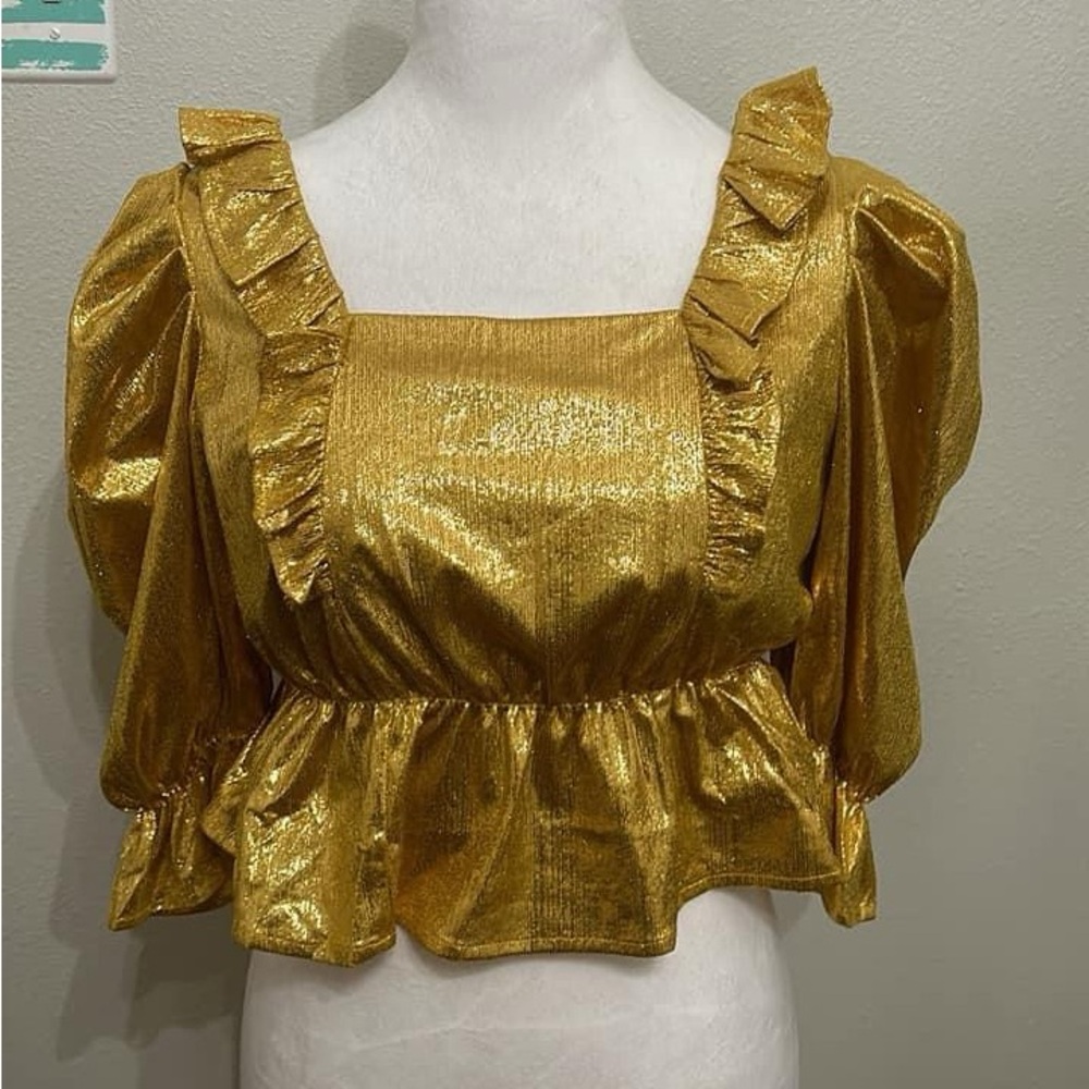 New without tags queen of sparkles, metallic, gold, top, size small.